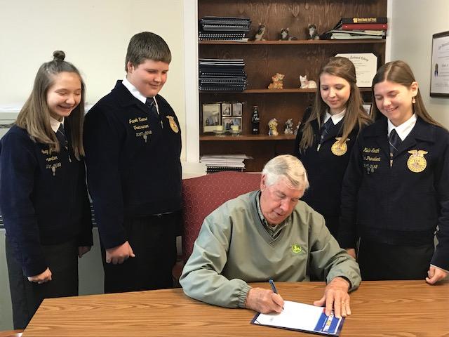 Franklin County FFA members met with Chairman of the Board of Commissioners, Thomas Bridges, to sign an official Proclamation declaring in National FFA Week in Franklin County.
